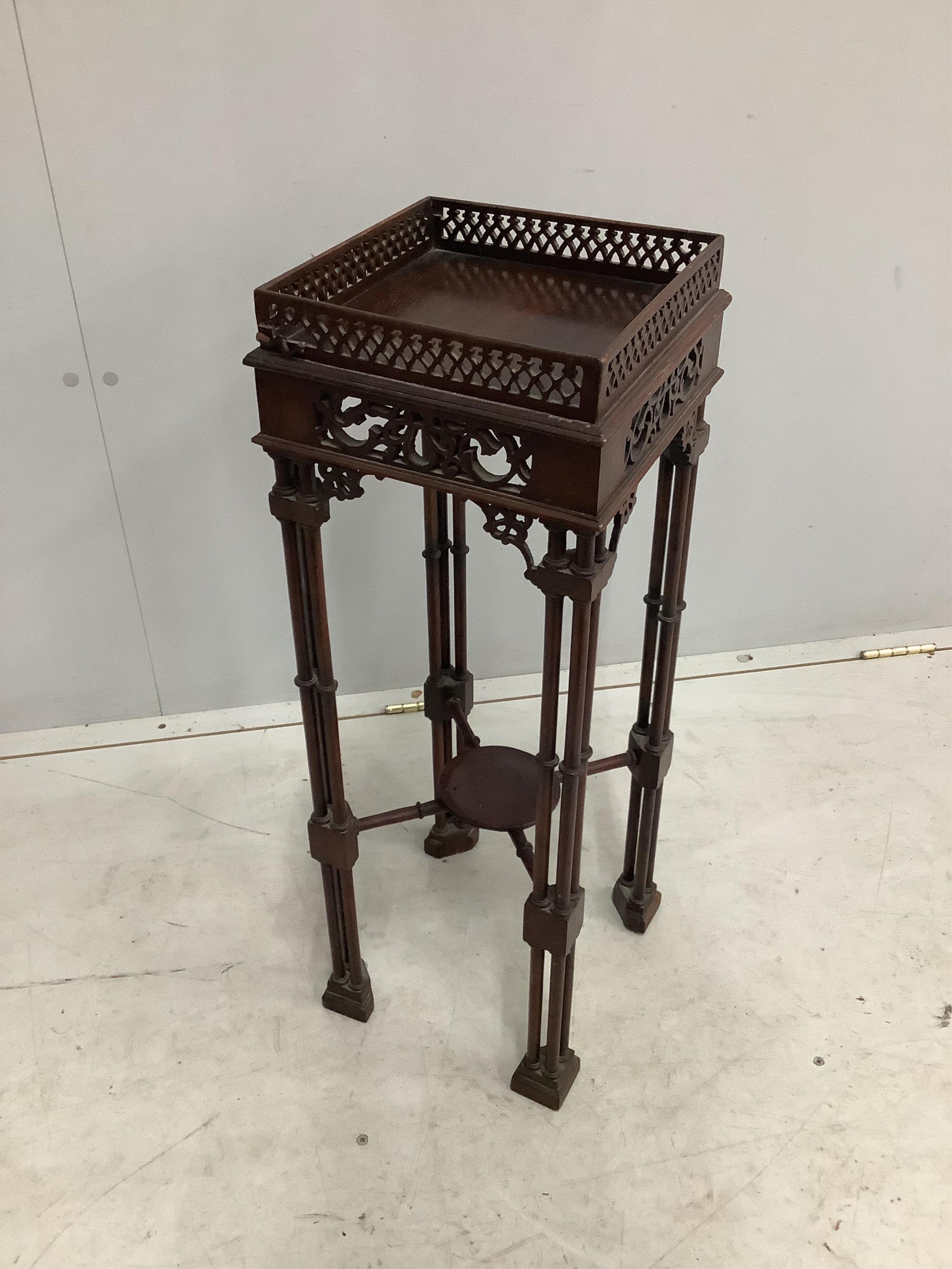 A Chippendale revival mahogany occasional table, width 25cm, height 72cm. Condition - poor to fair, damage to blind fret